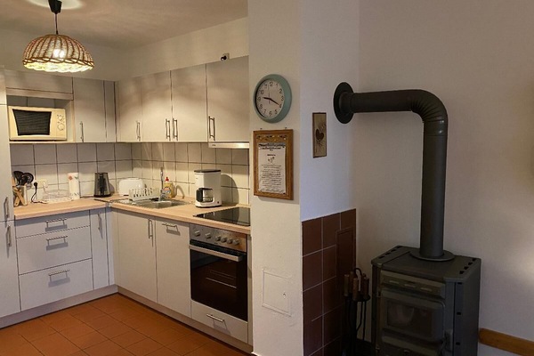 Ferienhaus mit Sauna und Gartenumzäunung-Ferienhäuser Schlossberg