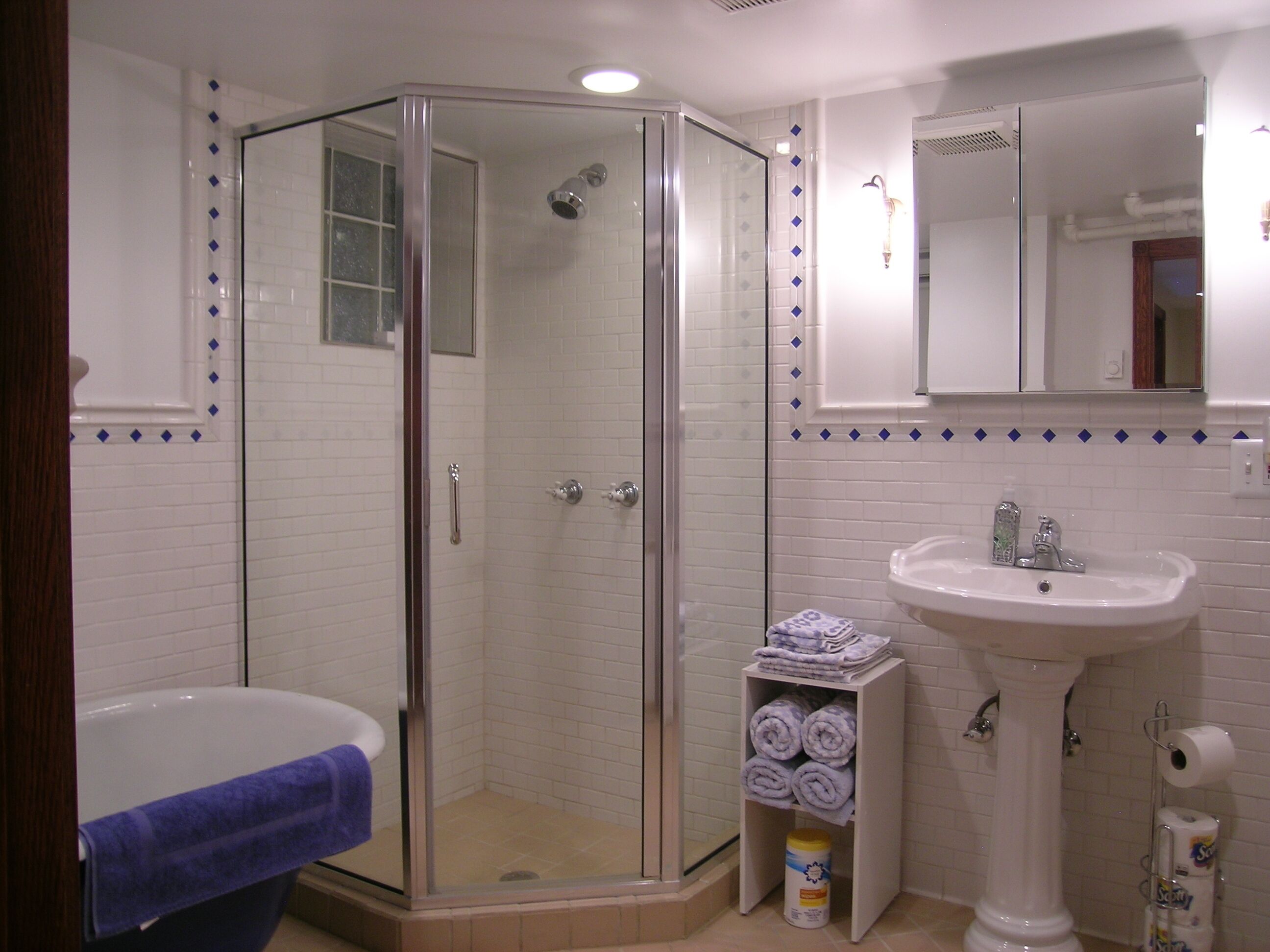 Bathtub, hair dryer, towels, soap