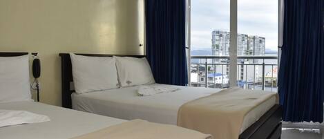 Deluxe Quadruple Room, 2 Double Beds, City View | City view