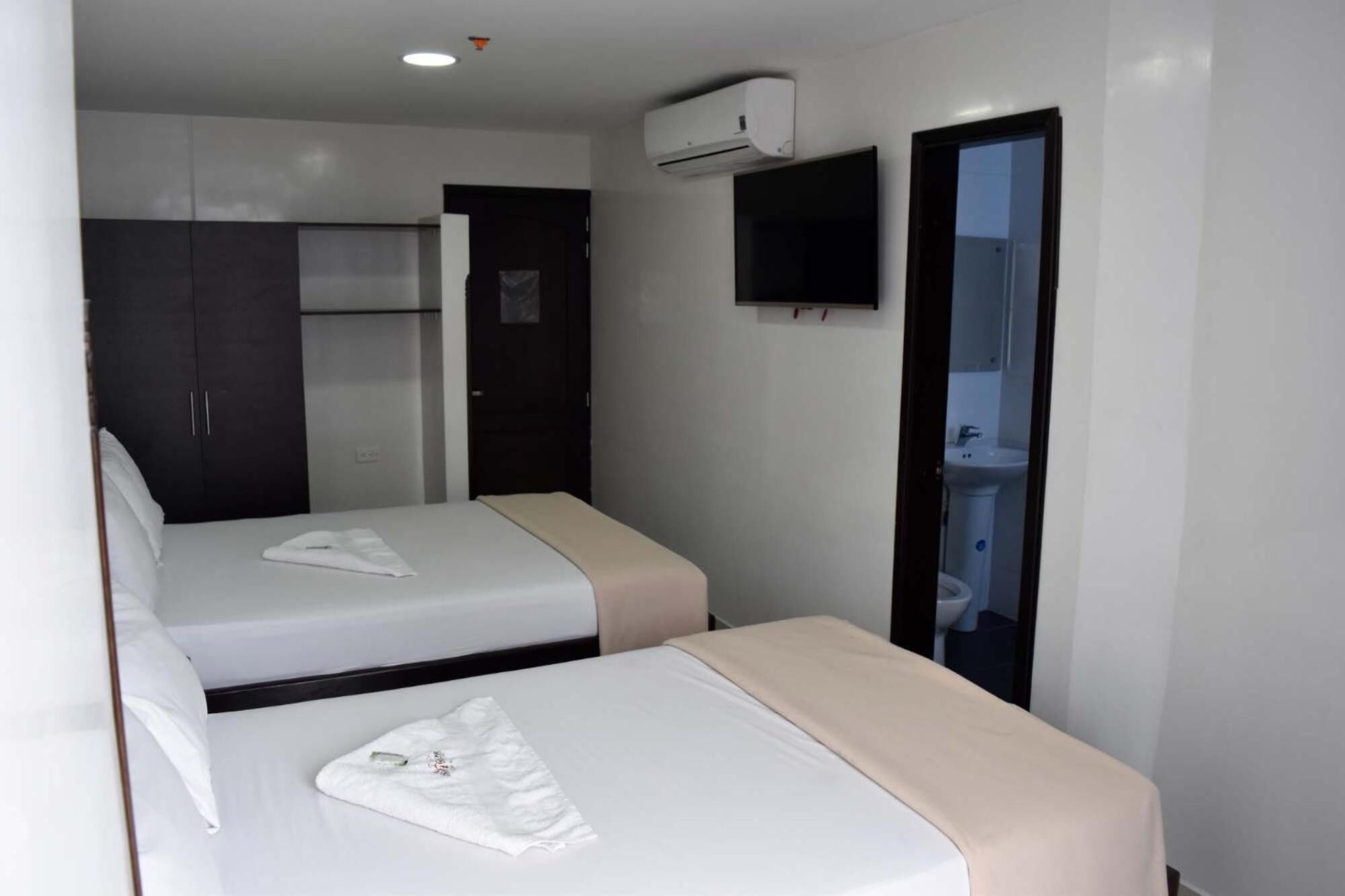 blackout curtains, iron/ironing board, free wifi, bed sheets