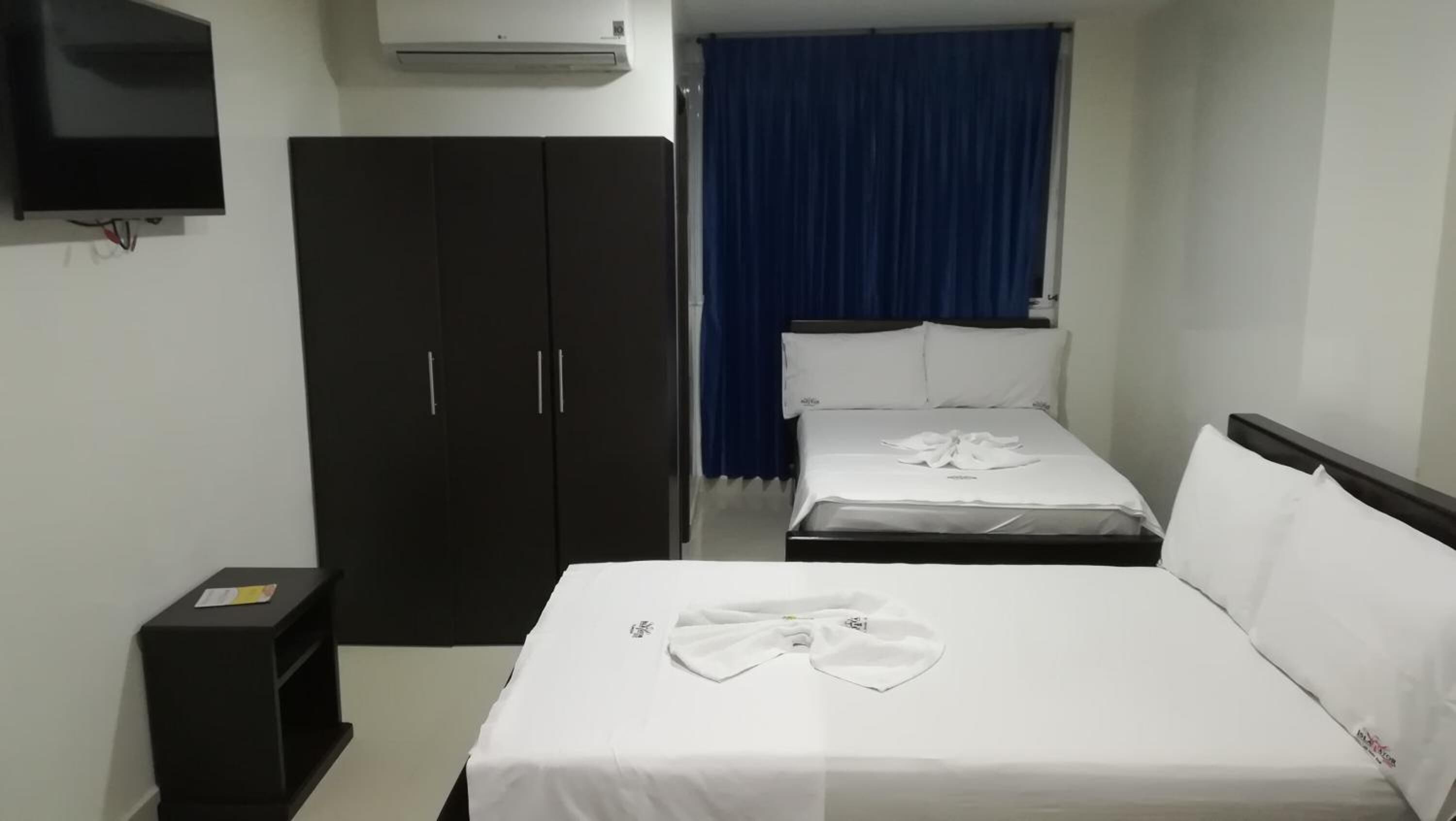 blackout curtains, iron/ironing board, free wifi, bed sheets