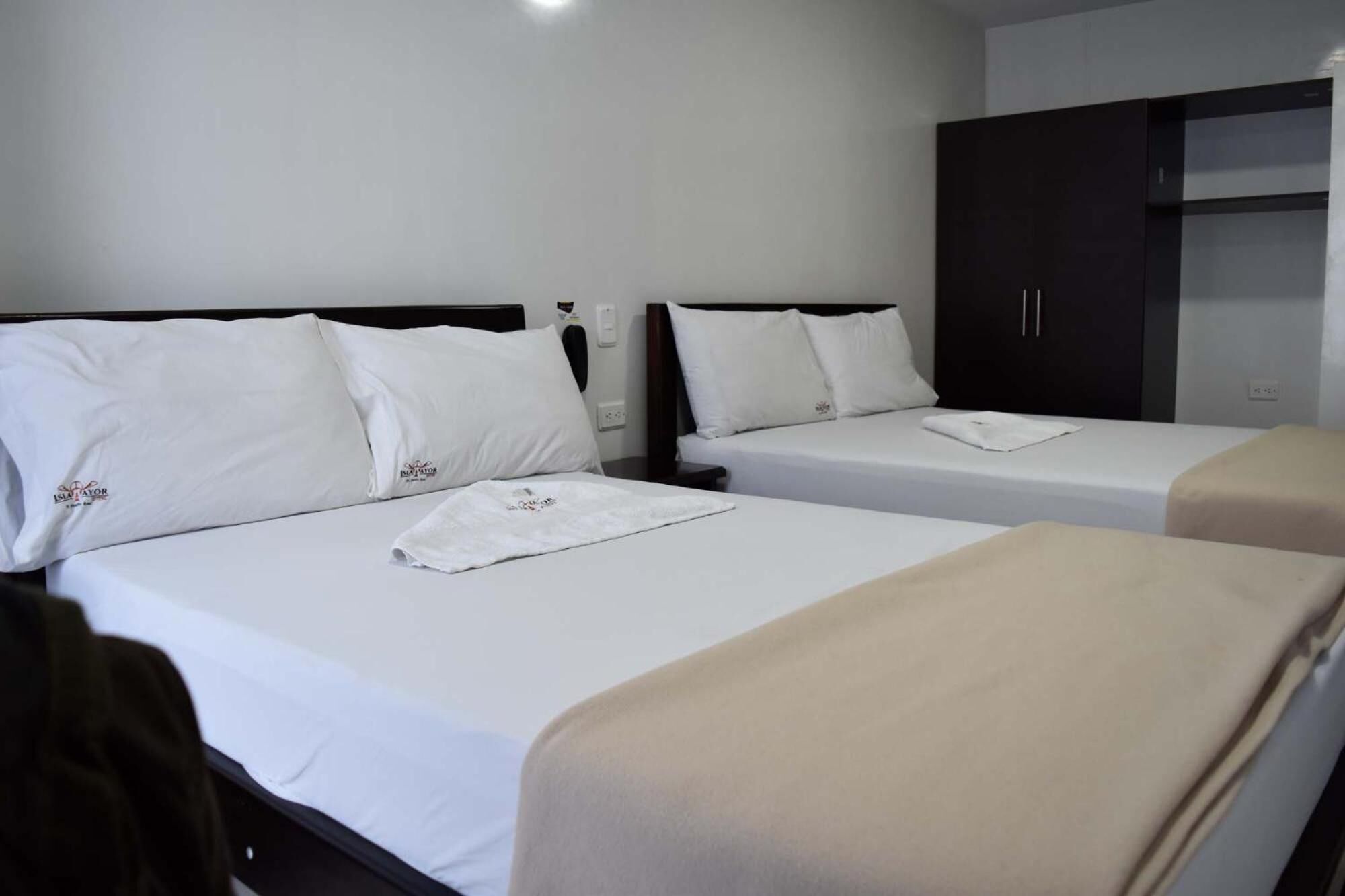 blackout curtains, iron/ironing board, free wifi, bed sheets