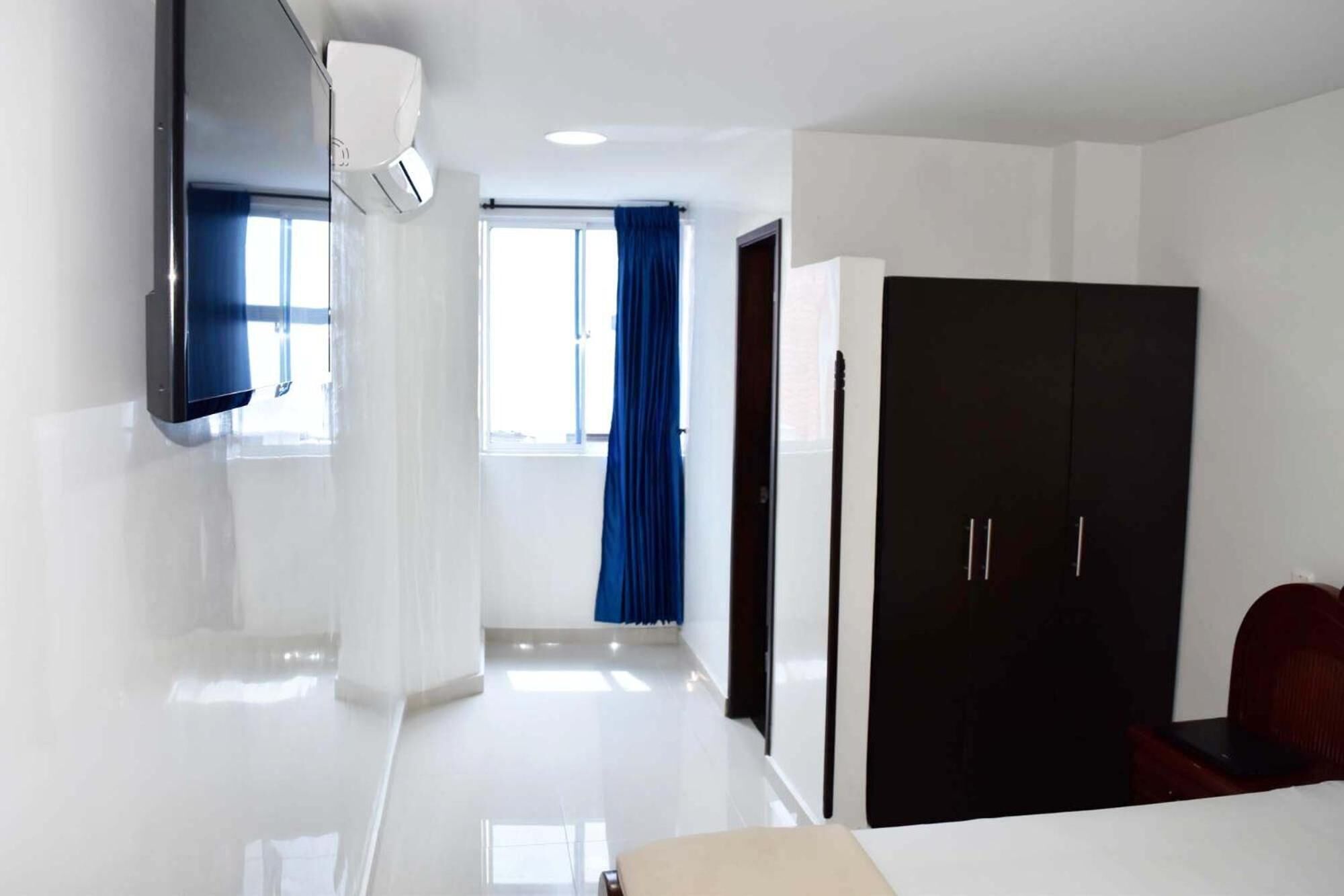 blackout curtains, iron/ironing board, free wifi, bed sheets