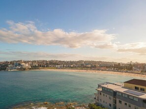 On the beach, sun-loungers, beach towels