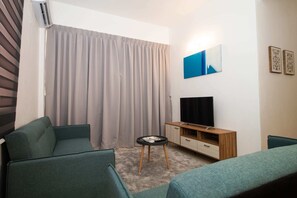Apartment, 3 Bedrooms | Living room | Flat-screen TV, Netflix