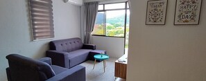 Apartment, 3 Bedrooms | Living room | Flat-screen TV, Netflix