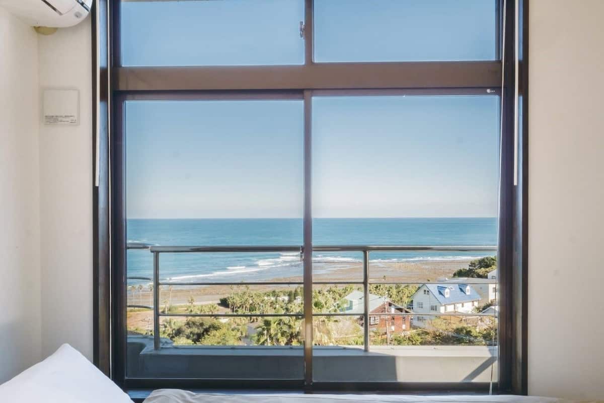 Standaard Twin kamer, uitzicht op zee | Een strijkplank/strijkijzer, gratis wifi, beddengoed