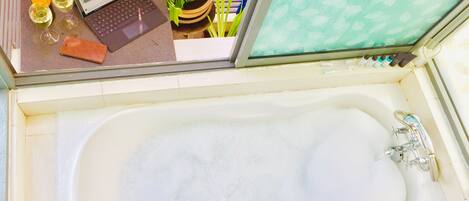 Hair dryer, towels, soap, shampoo
