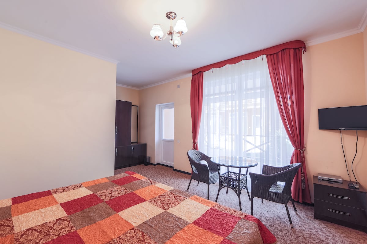 Luxury Room, Multiple Beds | Iron/ironing board (on request), bed sheets