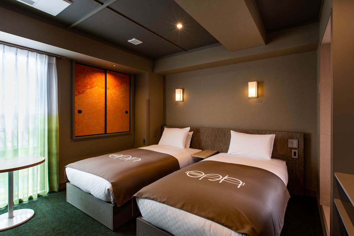 classic twin room, 2 single beds, non smoking, private bathroom | in-room safe, individually furnished, blackout curtains