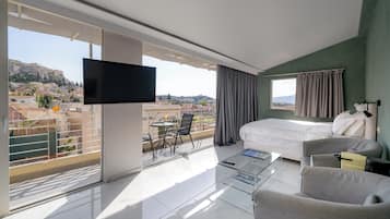 Penthouse, 1 Queen-Bett, Hügelblick | Zimmersafe, individuell dekoriert, individuell eingerichtet