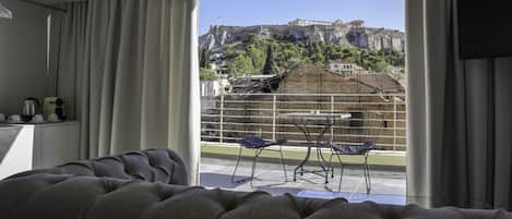 Apartamento superior, 1 cama de matrimonio con sofá cama, vistas a la colina | Zona de estar | Una televisión