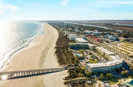 On the beach. Super Modern, Ocean Front Condo!! Community Pool & Pier! Heart of IOP! *Unit 212*