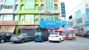 A multi-story building with various shops on the ground floor, including a Viva mobile store. - Stada Hotel (Kota Bharu)