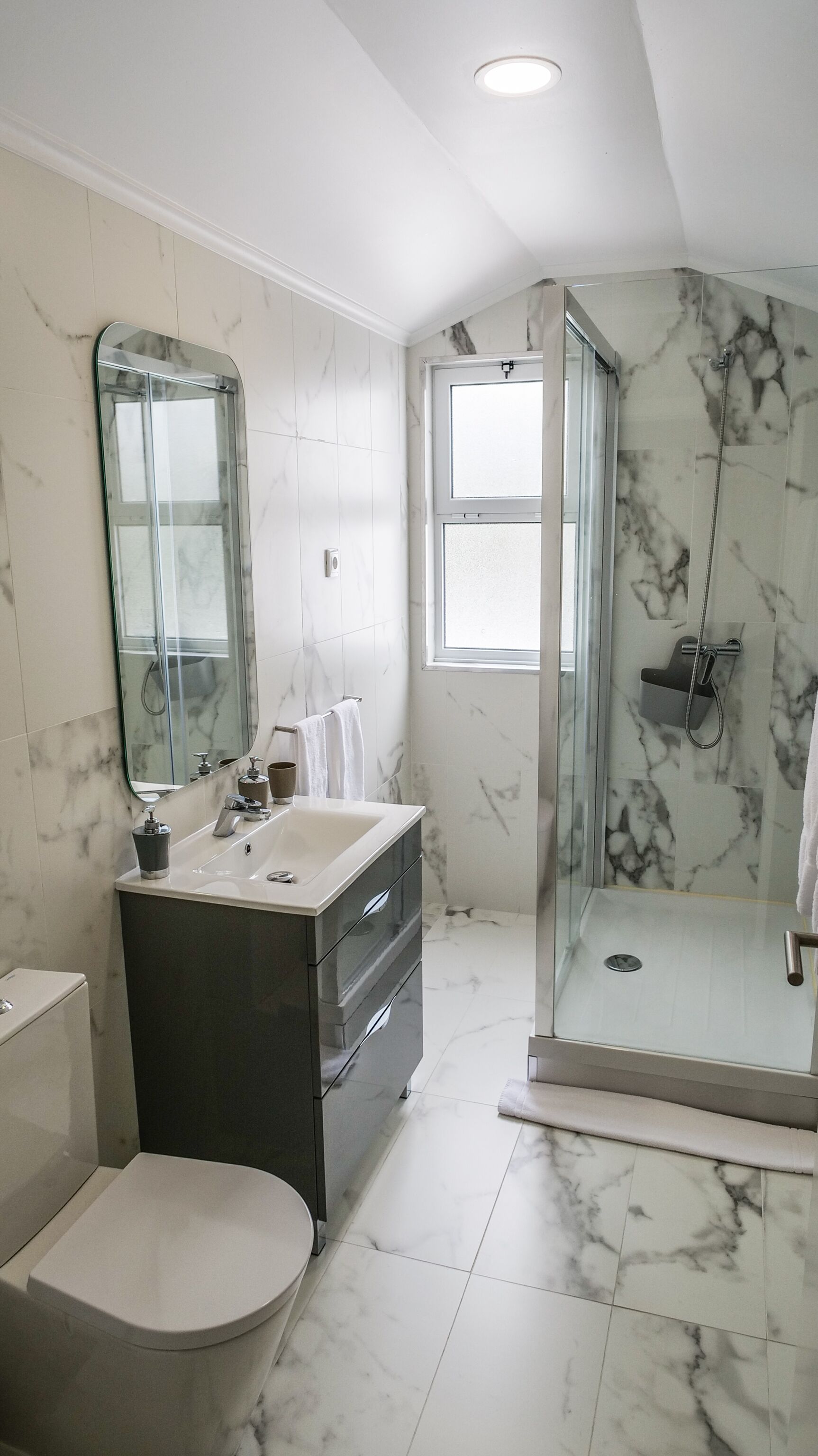 exclusive loft, multiple beds, city view | bathroom | shower, rainfall showerhead, free toiletries, hair dryer