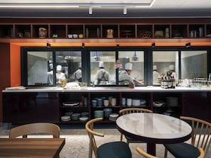 Breakfast, lunch, dinner served; international cuisine, garden views