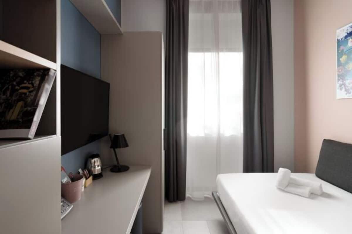 Premium bedding, down comforters, pillowtop beds, in-room safe