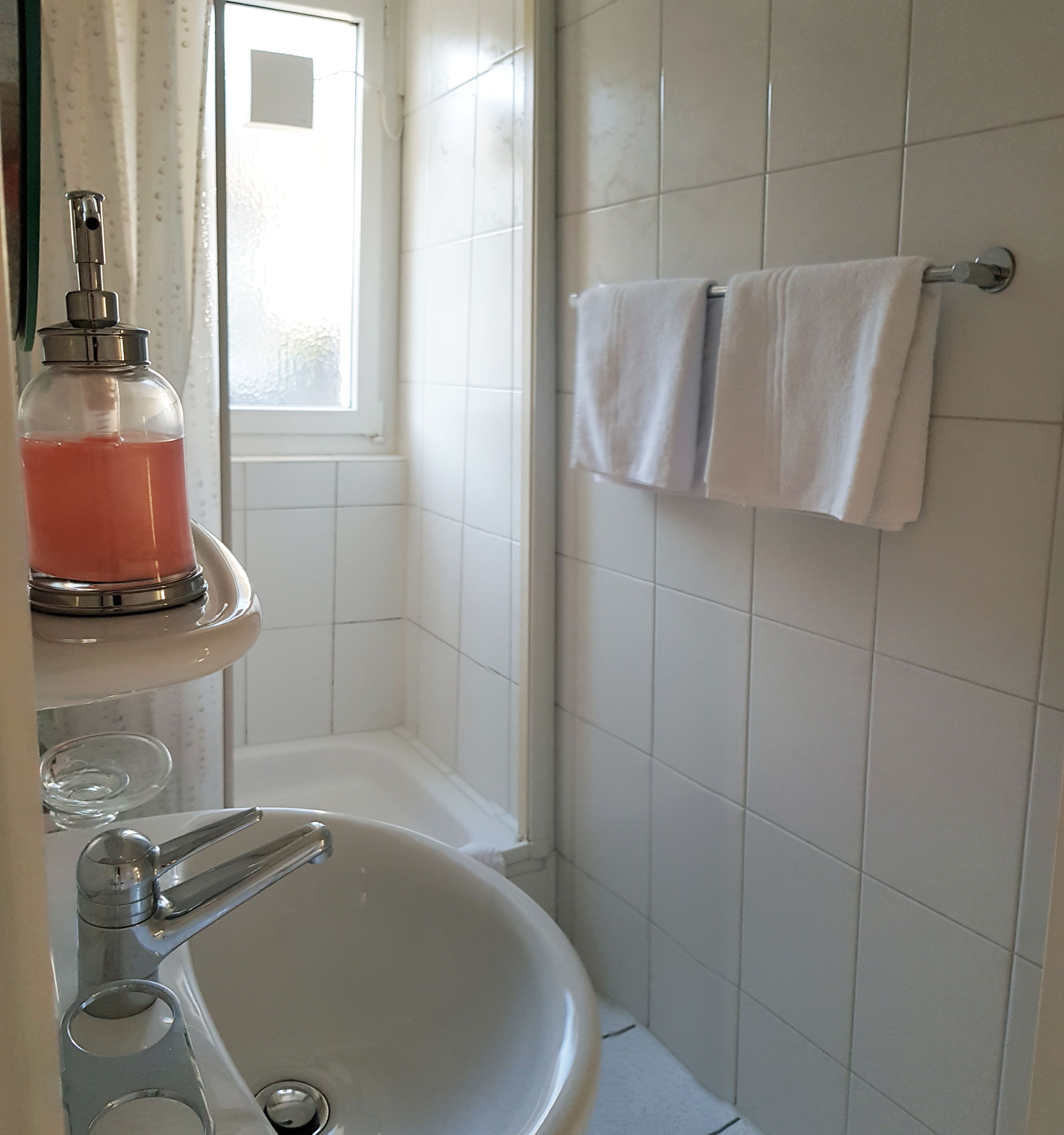 basic triple room | bathroom | shower, hair dryer, towels, soap
