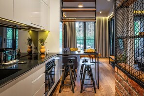 Elite Apartment, Air conditioning, Courtyard View | In-room dining - apartamenty-wroc Księcia Witolda (Wroclaw)