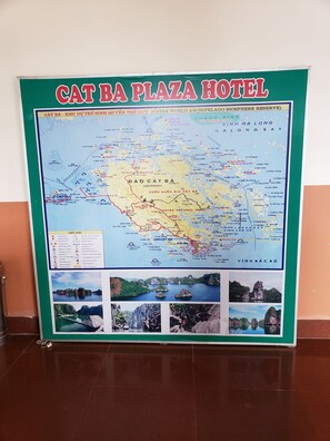 A map of Cat Ba Island highlighting attractions and accommodations, including Cat Ba National Park and the Cat Ba World Archipelago Biosphere Reserve. - Cat Ba Plaza Hotel (Hai Phong)