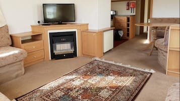 2 Bedroom Static Caravan (Double Glazed, Central Heating).  | Living area | Flat-screen TV