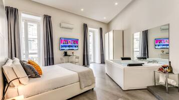 Suíte luxo, sauna seca | 1 quarto, roupas de cama premium, frigobar, cofres nos quartos