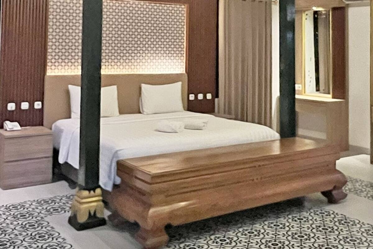 Cottage Keluarga, 1 Tempat Tidur King, pemandangan kebun, area halaman | Bantalan ekstra lembut, tirai kedap cahaya, kedap suara, dan Wi-Fi