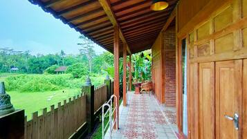 Deluxe Cottage, 1 Queen Bed, Terrace | Pillowtop beds, blackout drapes, soundproofing, WiFi