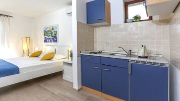 Romantic Studio, Ground Floor | Private kitchenette | Fridge, electric kettle, cookware/dishes/utensils, spices