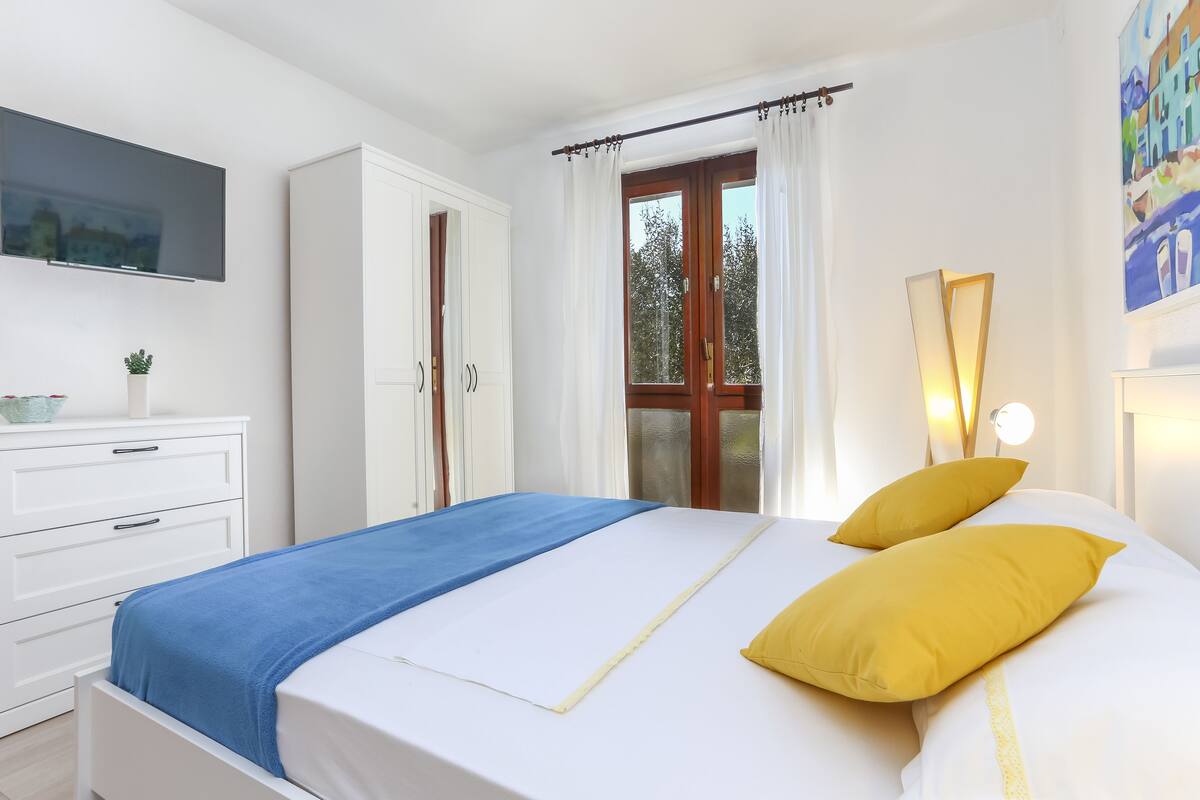 Down comforters, memory foam beds, in-room safe, desk