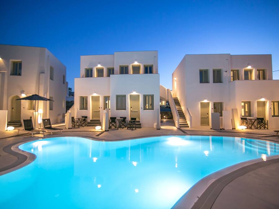 Outdoor pool, open 9:00 AM to 8:00 PM, pool umbrellas, pool loungers