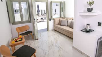 Executive Suite, Pool View | Living area | 32-inch flat-screen TV with satellite channels, TV, Netflix