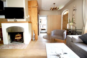 Apartment, 2 Bedrooms, Ground Floor | Living area | Flat-screen TV, DVD player