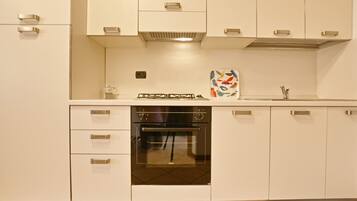 Apartment, 2 Bedrooms | Private kitchen | Full-sized fridge, microwave, oven, stovetop
