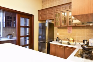 Villa | Private kitchen | Fridge, microwave, stovetop, electric kettle