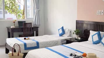 Family Triple Room, 1 Bedroom | In-room safe, desk, free WiFi, bed sheets