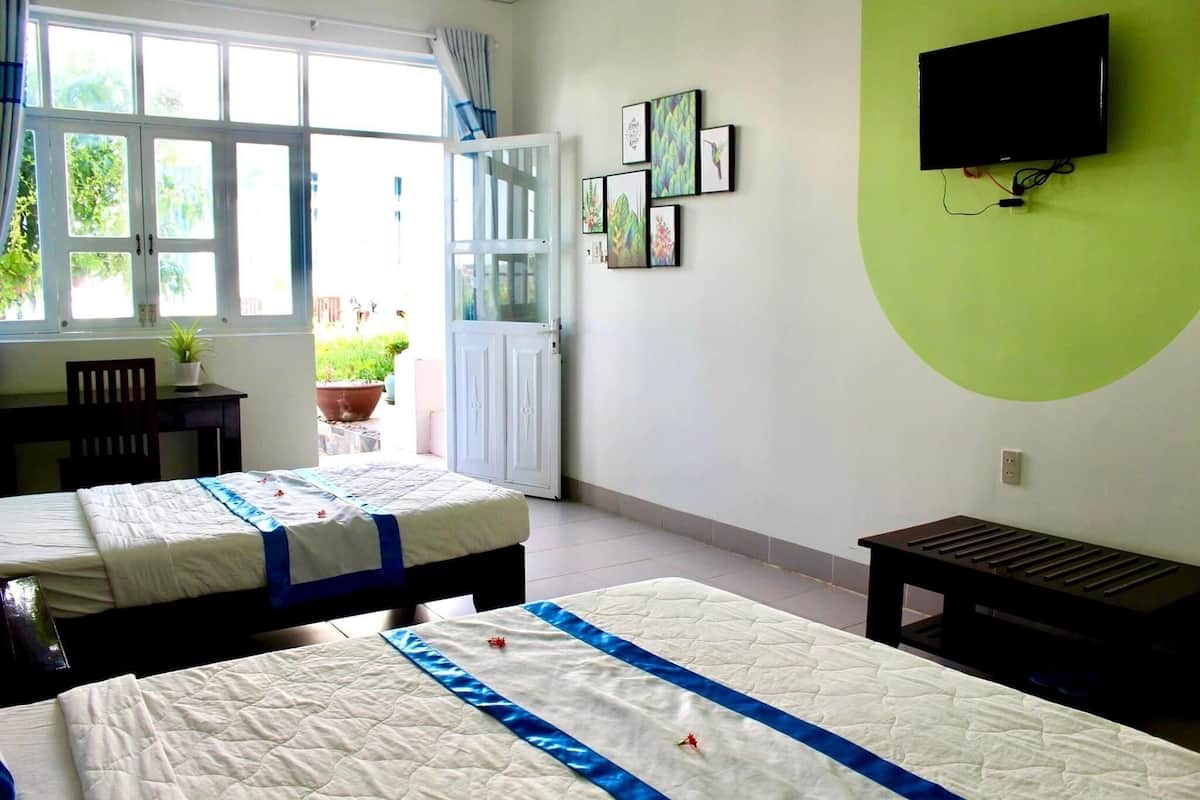 Family Triple Room, 1 Bedroom | In-room safe, desk, free WiFi, bed sheets