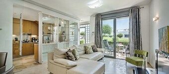 Modern 2-bedroom luxury apartment with patio and  large communal swimming pool