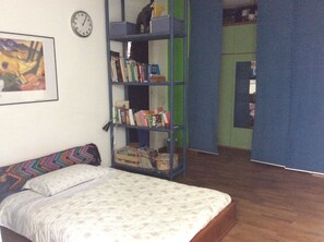 Hypo-allergenic bedding, down duvets, desk, laptop workspace