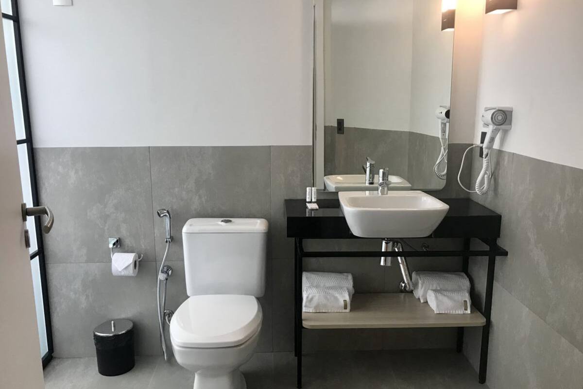 suite | bathroom | shower, designer toiletries, hair dryer, towels
