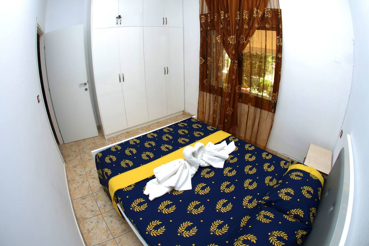 Apartment, 1 Bedroom, Balcony | In-room safe, desk, iron/ironing board, WiFi (free)