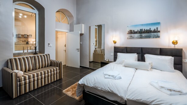 Deluxe appartement, Meerdere bedden | Een minibar, een strijkplank/strijkijzer, gratis babybedden, gratis wifi