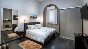 Deluxe appartement, Meerdere bedden | Een minibar, een strijkplank/strijkijzer, gratis babybedden, gratis wifi