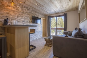 Appartement, salle de bains attenante (Domaine du Jardin Alpin ) | Coin séjour