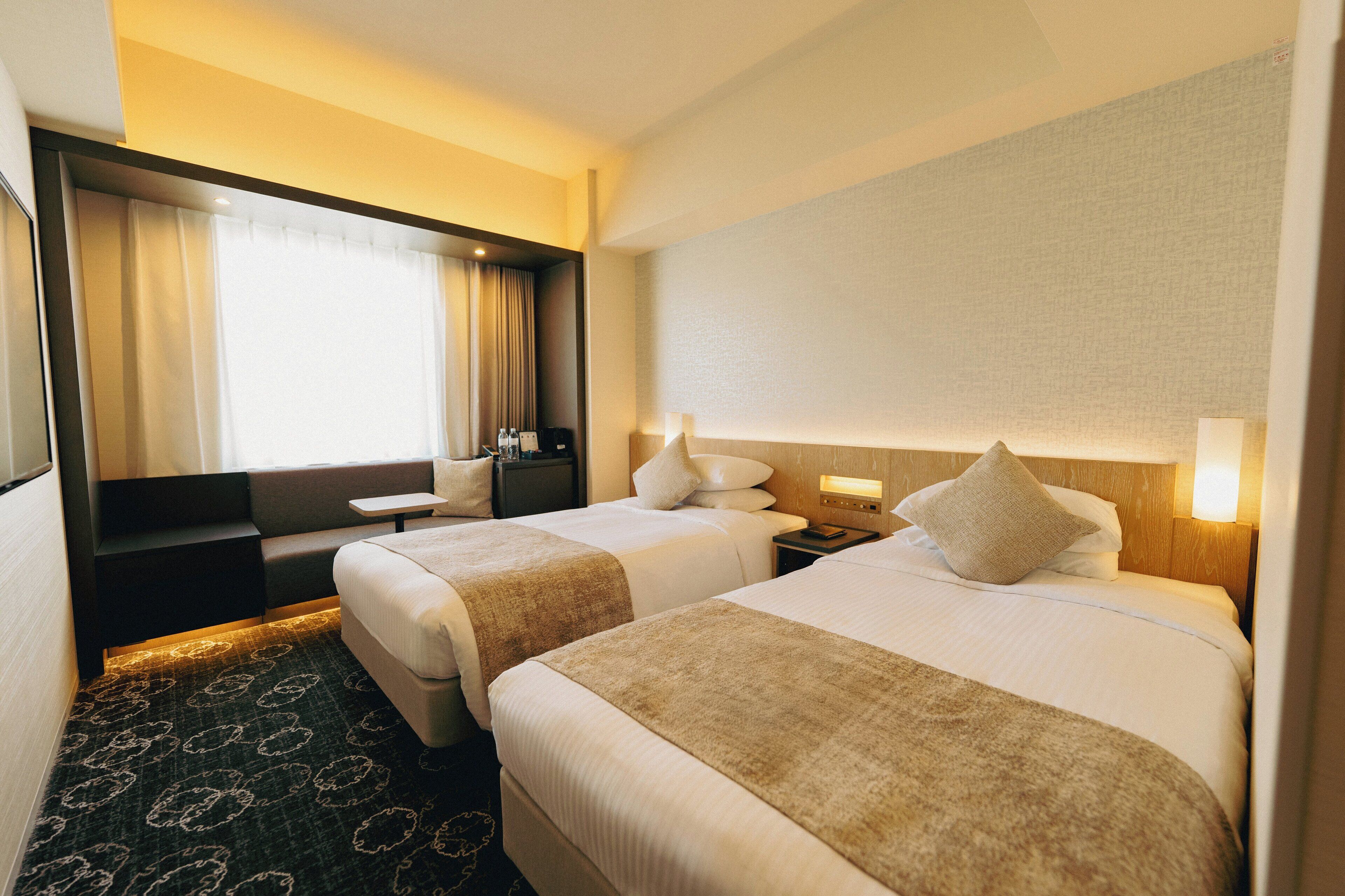 Twin kamer, niet-roken (Moderate) | Een kluis op de kamer, verduisterende gordijnen, geluiddichte muren