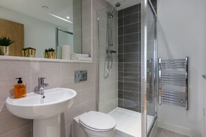 Shower, hair dryer, towels, soap