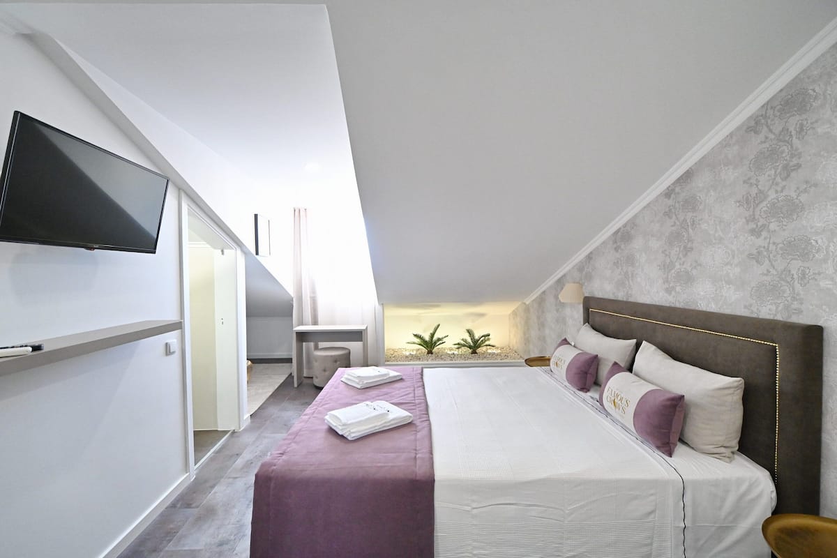 Double, Private Bathroom, Low Ceiling (4th Floor) | 1 bedroom, in-room safe, individually decorated, individually furnished