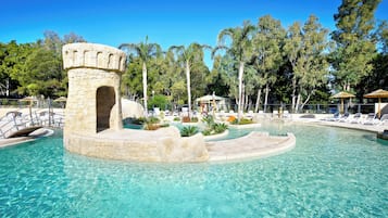 Seasonal outdoor pool, open 9:00 AM to 8:00 PM, pool umbrellas
