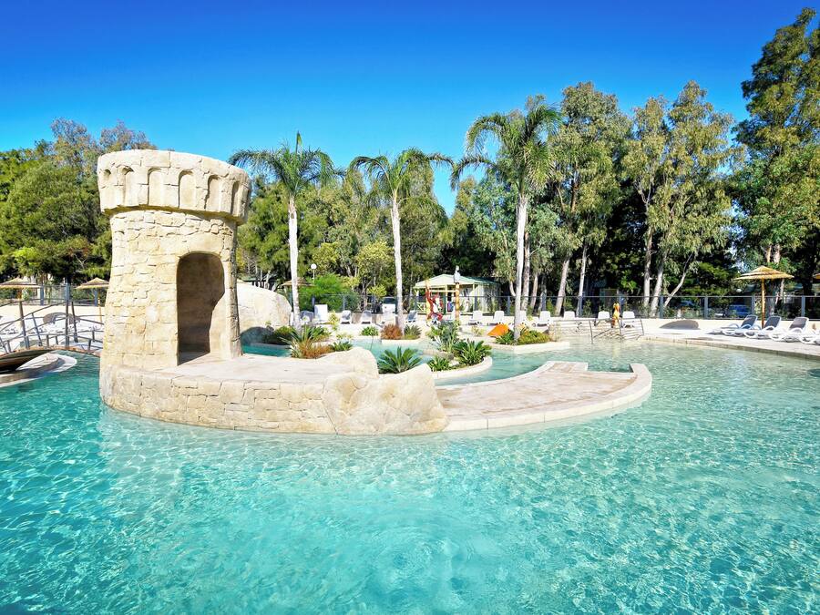 Seasonal outdoor pool, open 9:00 AM to 8:00 PM, pool umbrellas