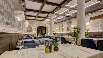 Breakfast, lunch, dinner served; Mediterranean cuisine, beach views
